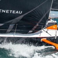 Closeup of Beneteau Figaro 3 sailboat in water