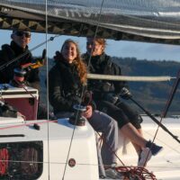 family sailing on a Beneteau First 24 SE
