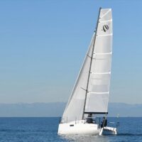 Beneteau First 27 SE with full white sails