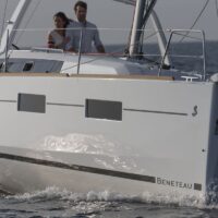 couple sailing a Beneteau Oceanis 35.1