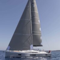 Beneteau Oceanis 51.1 side view with full sails
