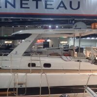 Beneteau Oceanis Yacht 62 sideview at a boat show
