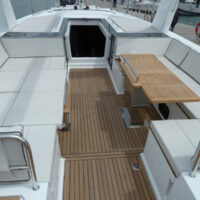 Beneteau Oceanis Yacht 62 deck table and seating area