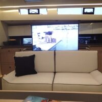 Beneteau Oceanis Yacht 62 saloon with television