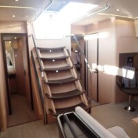 Beneteau Oceanis Yacht 62 interior stairs from saloon