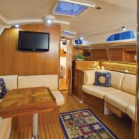 Catalina Yachts 385 saloon with seating area and television