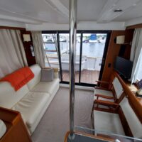 2015 Beneteau Swift Trawler 34 cabin with seating area