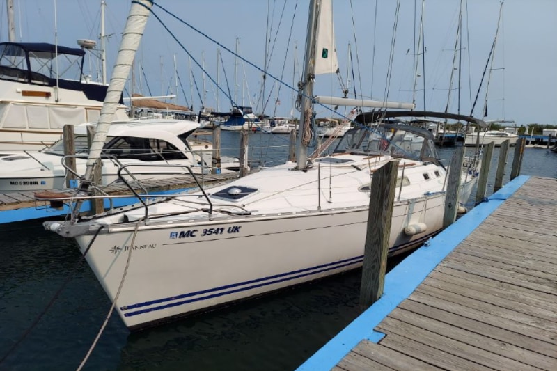 2000 Jeanneau 34.2 sailboat docked in Port Sanilac Marina