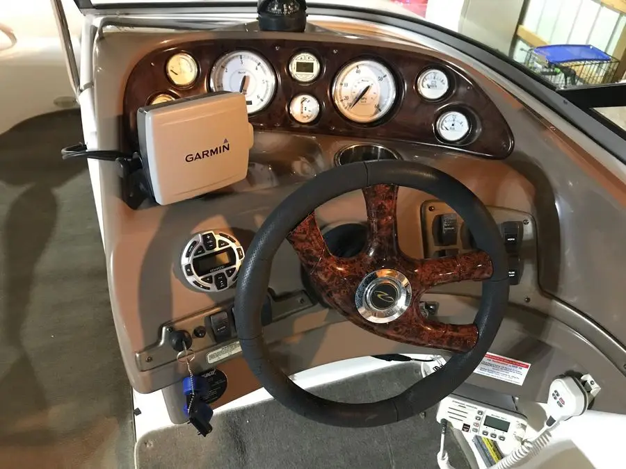control panels and wheel of the 2005 Regal 2120 Destiny powerboat