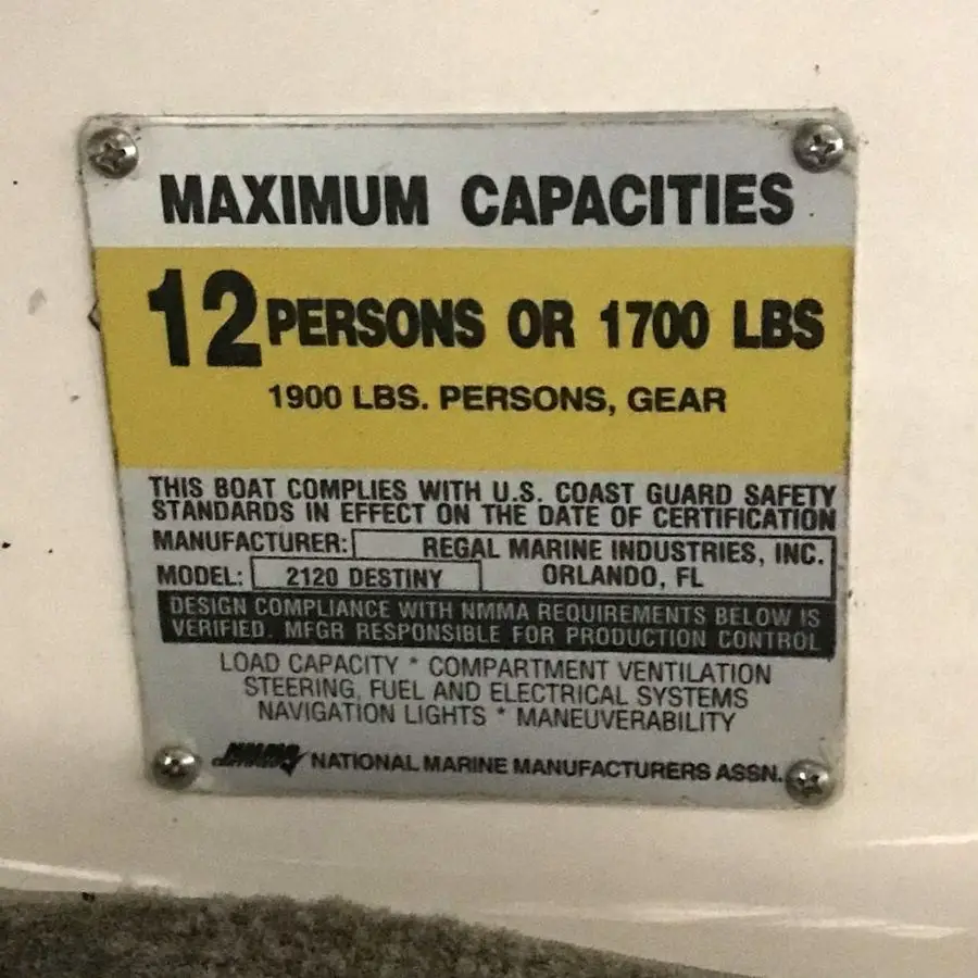 information tag for 12 person maximum capacity on the 2005 Regal 2120 Destiny powerboat