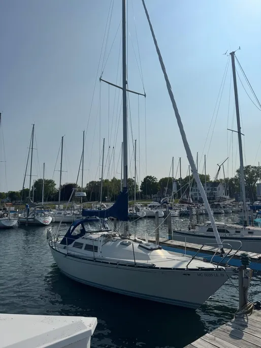 1980 C&C 32 sail boat in marina