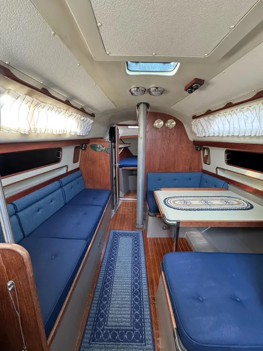 1980 C&C 32 sail boat seating area and dining table