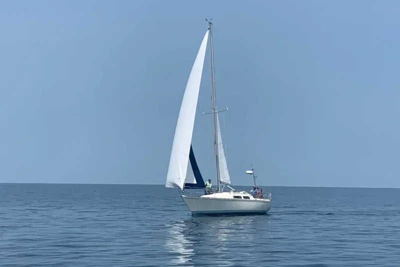 1980 C&C 32 sail boat out on the open water
