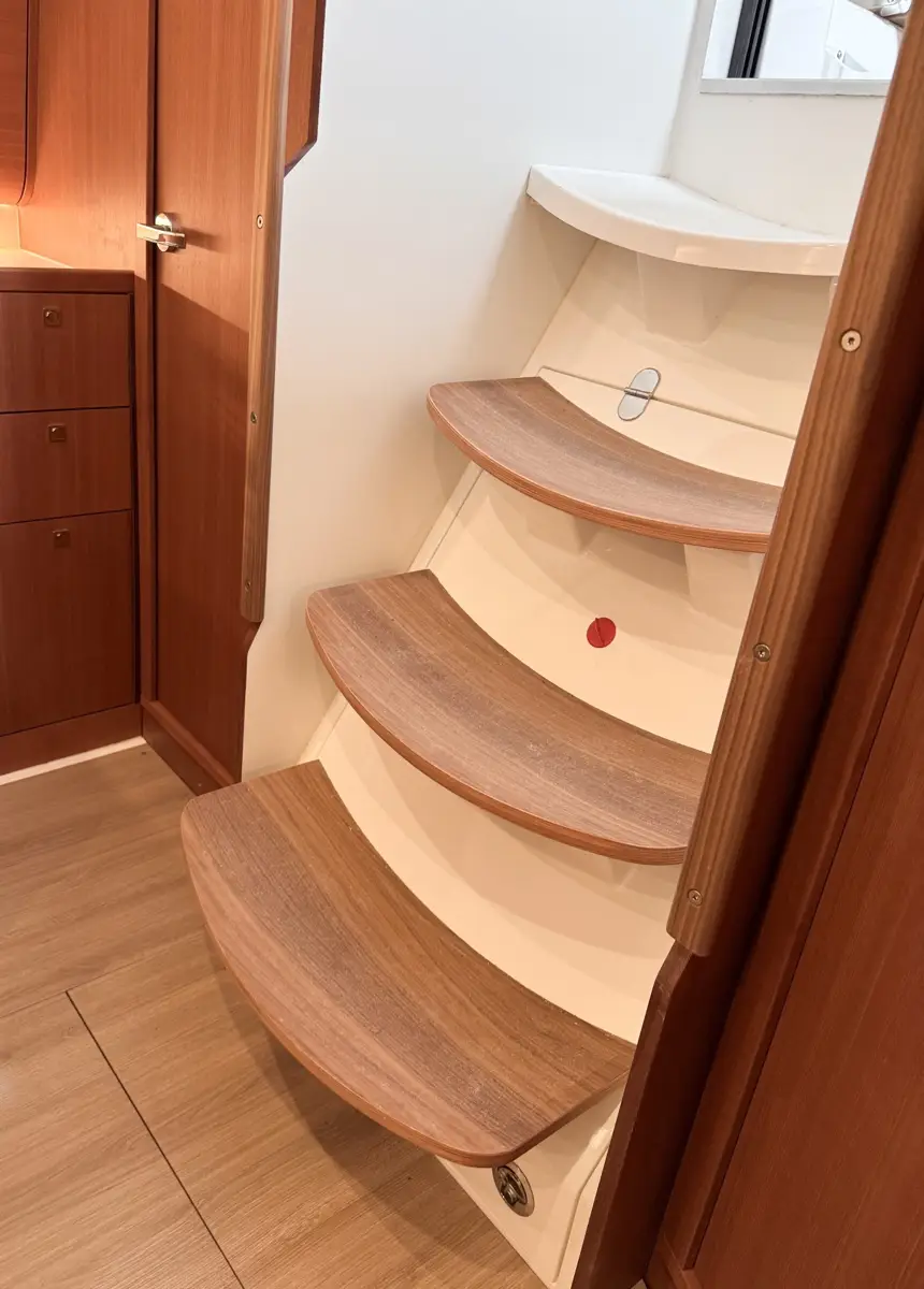 Stairs into cabin area of a J-Boat J-36 sailboat.