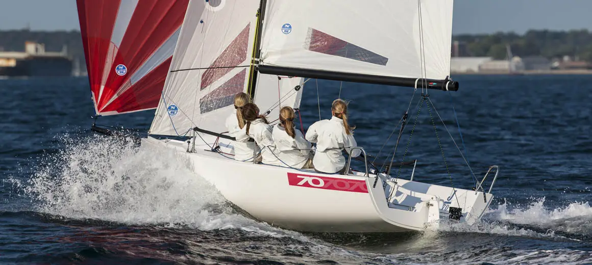 Four woman crew on a J-Boat J70 sailboat.