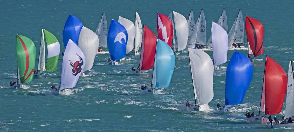 Group of J-Boat J70 sailboats during a race.