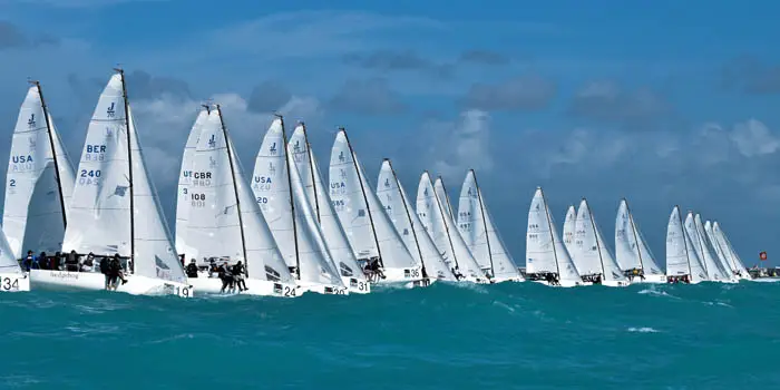 Group of J-Boat J70 sailboats during a race.
