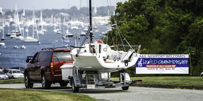 J-Boat J70 sailboat on a trailer going into a marina.