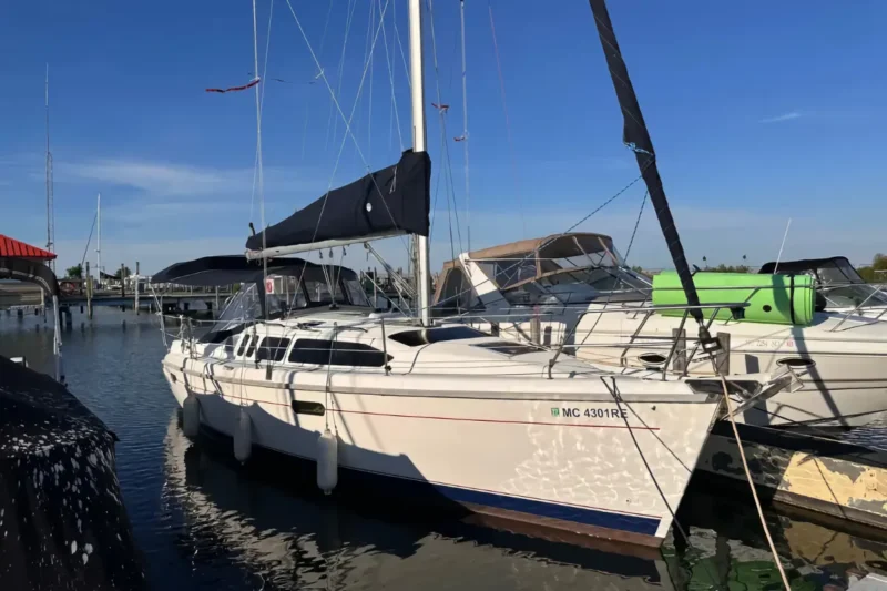 1997 Hunter 336 sailboat docked in a marina.
