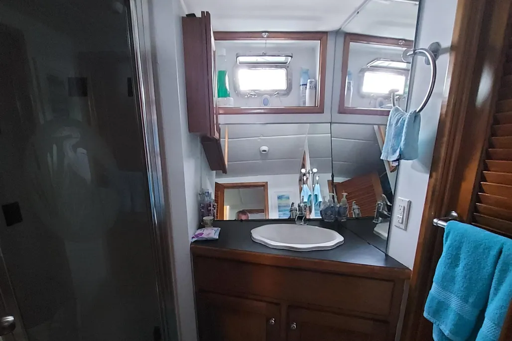 Head with sink and mirrors on a 2003 Dovercraft 43 powerboat.