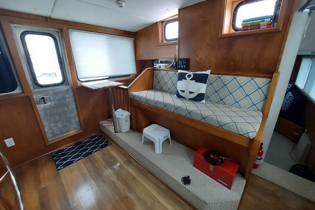Bench seating in the salon of a 2003 Dovercraft 43 powerboat.